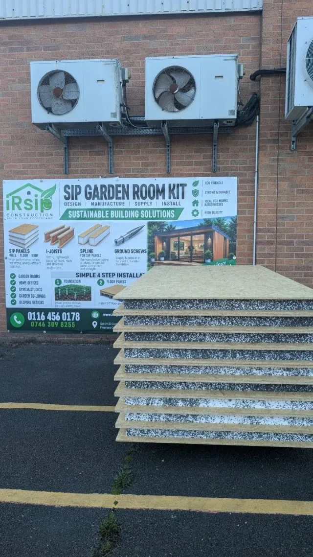 Stack of IRSIP SIP panels with OSB3 faces and EPS cores outside the IRSIP factory in Leicester